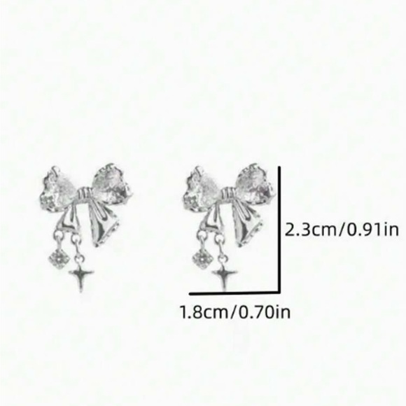 Zirconia bow with cross and crystal stud earrings - Picture 2 of 4